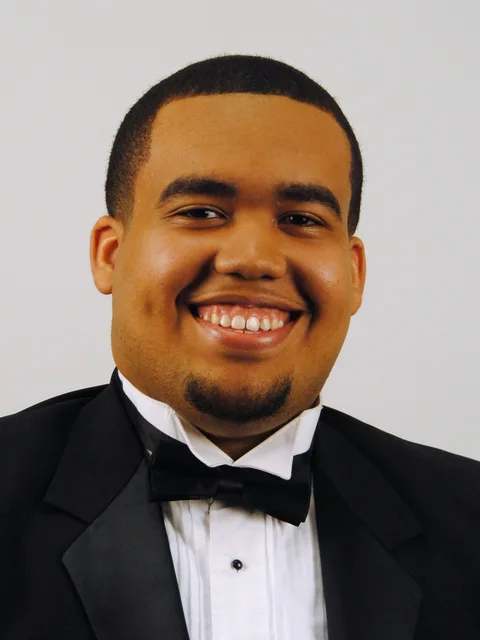 Professional headshot of Domonique Ransom, Beautillion Leadership Academy Class of 2011.