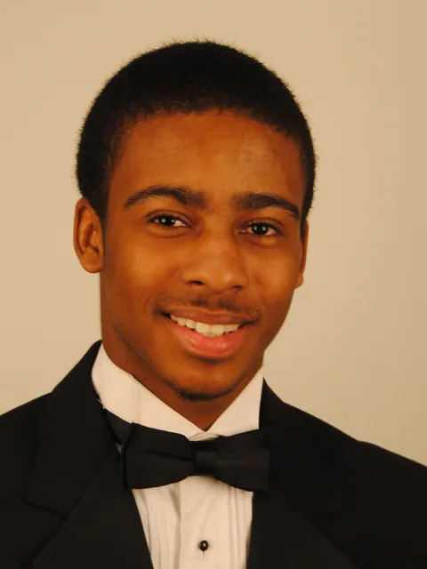 Professional headshot of Kayode Gloster, Beautillion Leadership Academy Class of 2011.