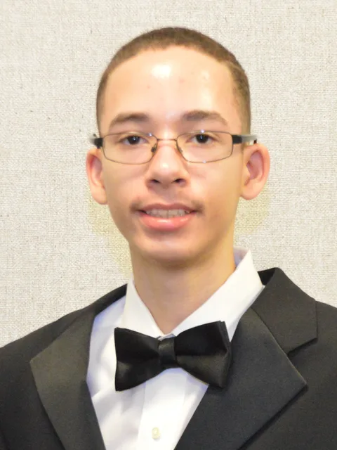 Professional headshot of Alex McGinnis, Beautillion Leadership Academy Class of 2017.